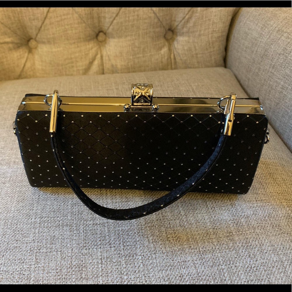 Classy and elegant! Top handle black dress bag